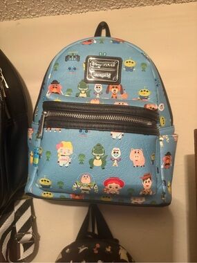 Loungefly Light Blue Toy Story Character Mini Backpack